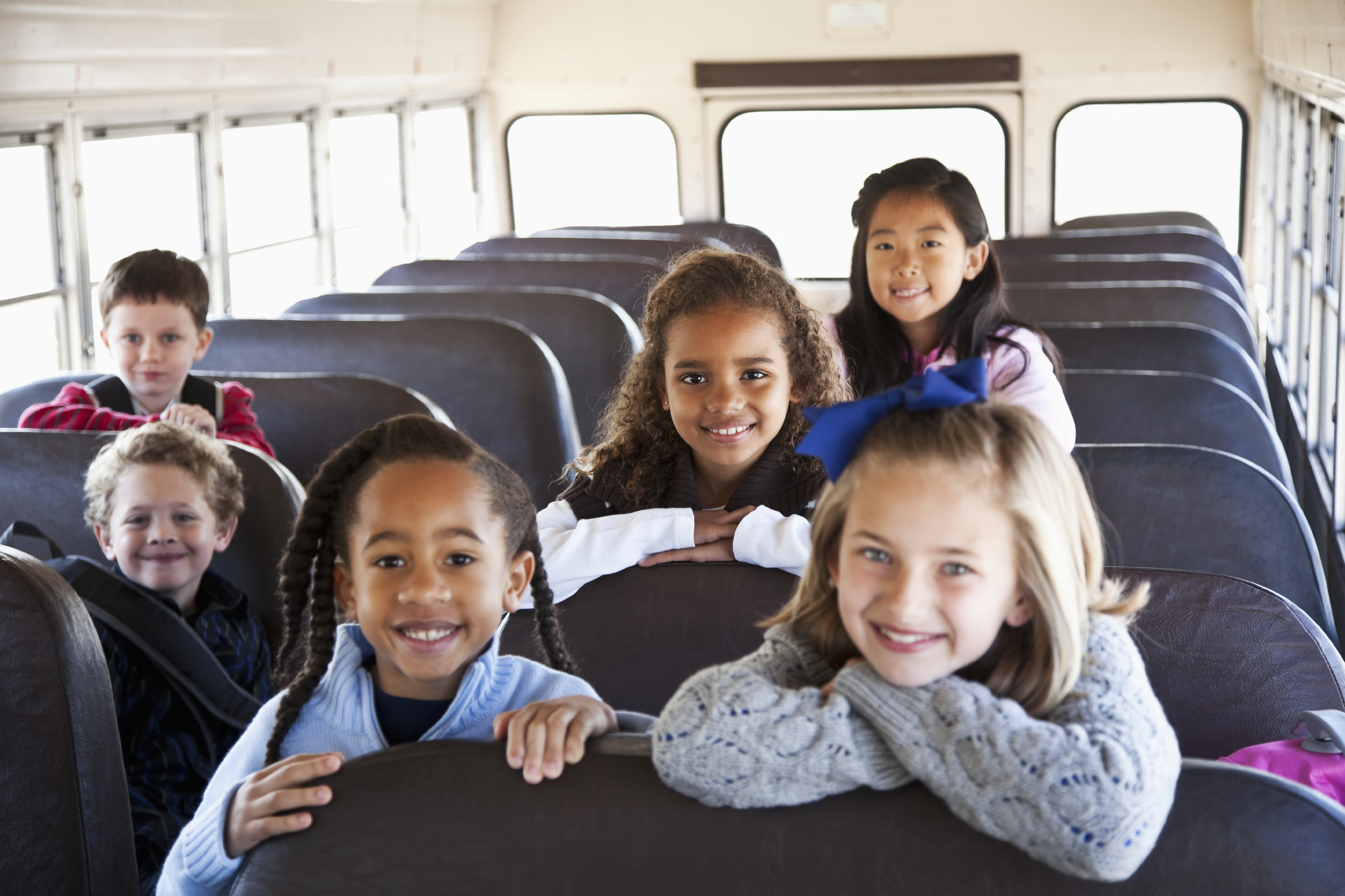 Children sitting inside school bus