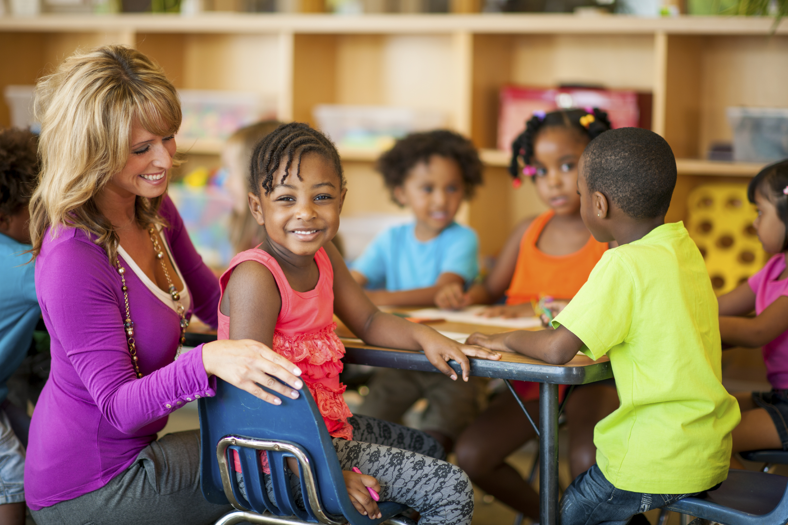 Multi ethnic group of pre-school children in a classroom.